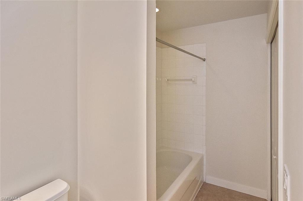 3830 Sawgrass Way, Unit 2914 Naples, FL 34112 - Photo 14 of 50 a bathroom with a bathtub