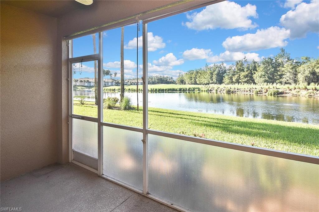 3830 Sawgrass Way, Unit 2914 Naples, FL 34112 - Photo 39 of 50 a view of a lake from a balcony