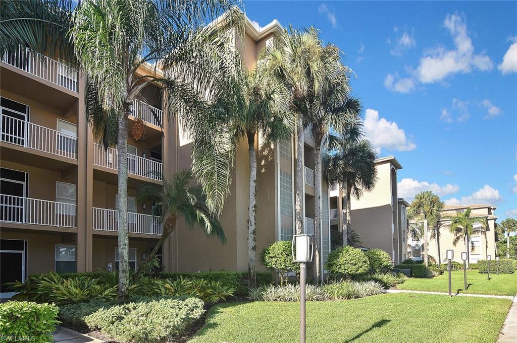 3830 Sawgrass Way, Unit 2914 Naples, FL 34112 - Photo 4 of 50 a view of a multi story building