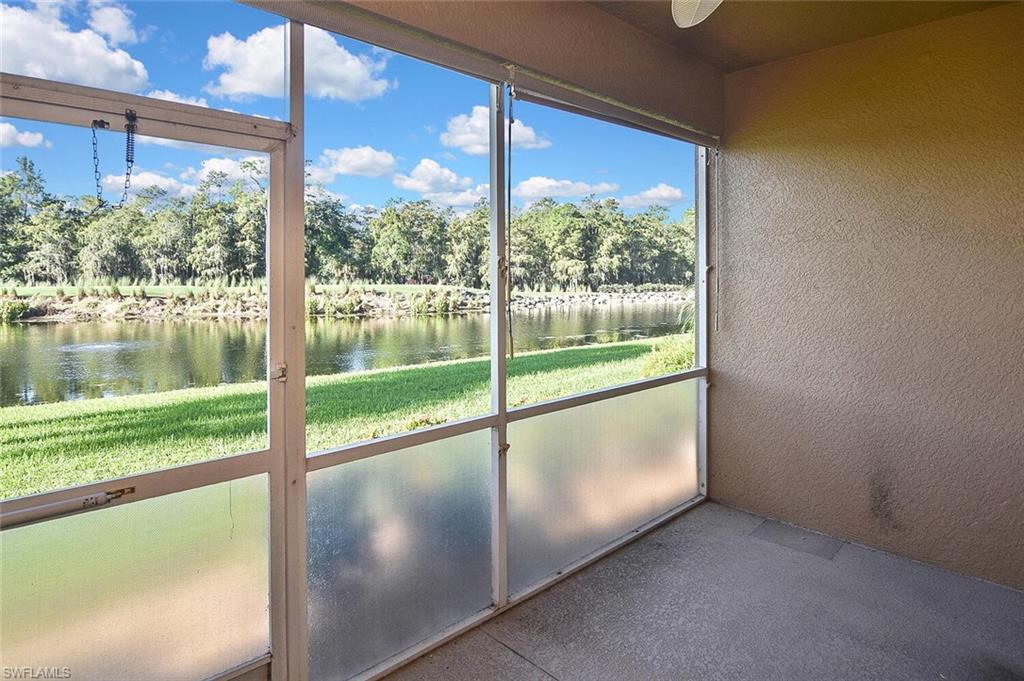 3830 Sawgrass Way, Unit 2914 Naples, FL 34112 - Photo 42 of 50 a view of a room with yard from a ceiling window