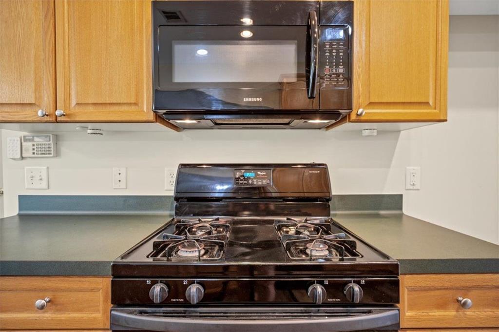 501 Middlebrooke Trace Canton, GA 30115 - Photo 14 of 29 a kitchen with stove and cabinets