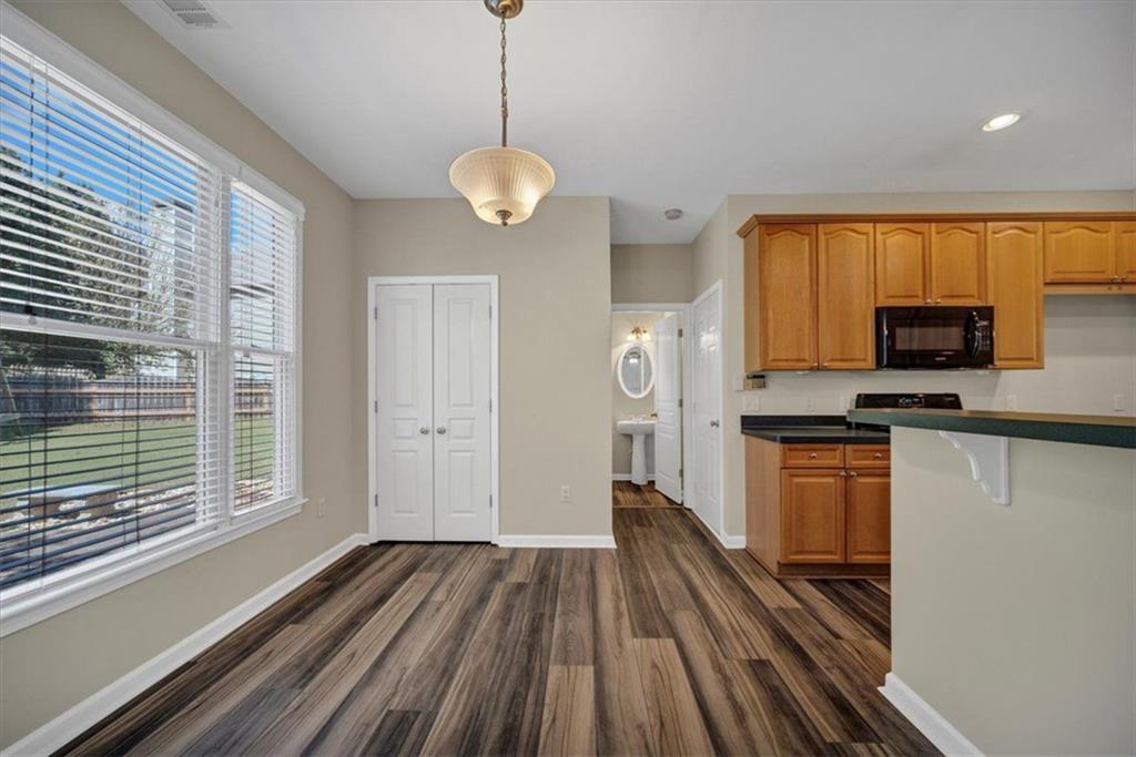 501 Middlebrooke Trace Canton, GA 30115 - Photo 17 of 29 a view of a kitchen with microwave and stove