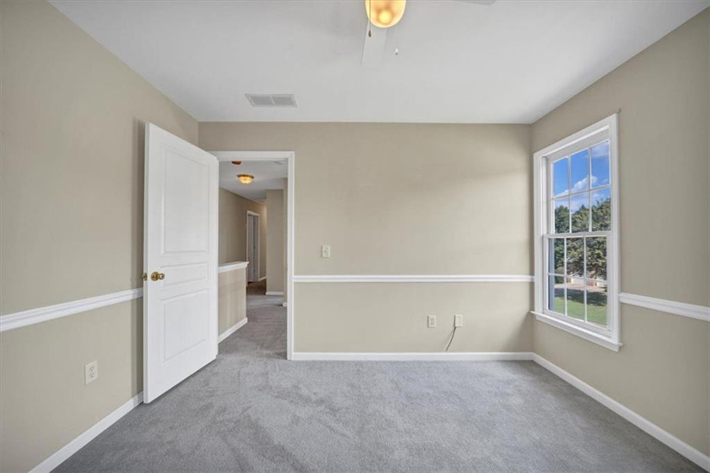 501 Middlebrooke Trace Canton, GA 30115 - Photo 29 of 29 an empty room with windows and entrance
