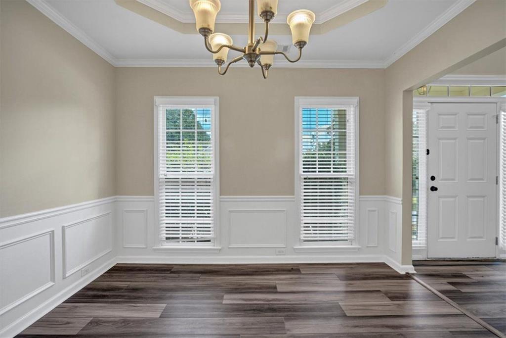 501 Middlebrooke Trace Canton, GA 30115 - Photo 7 of 29 a view of a livingroom with wooden floor and a window