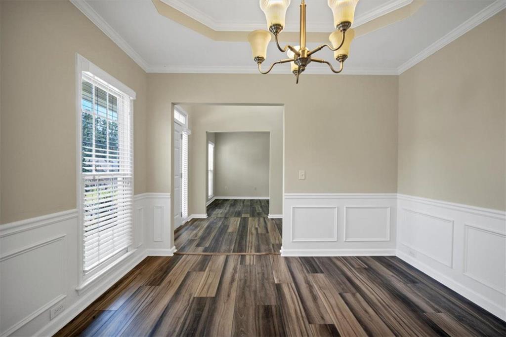 501 Middlebrooke Trace Canton, GA 30115 - Photo 8 of 29 a view of a room with wooden floor and window