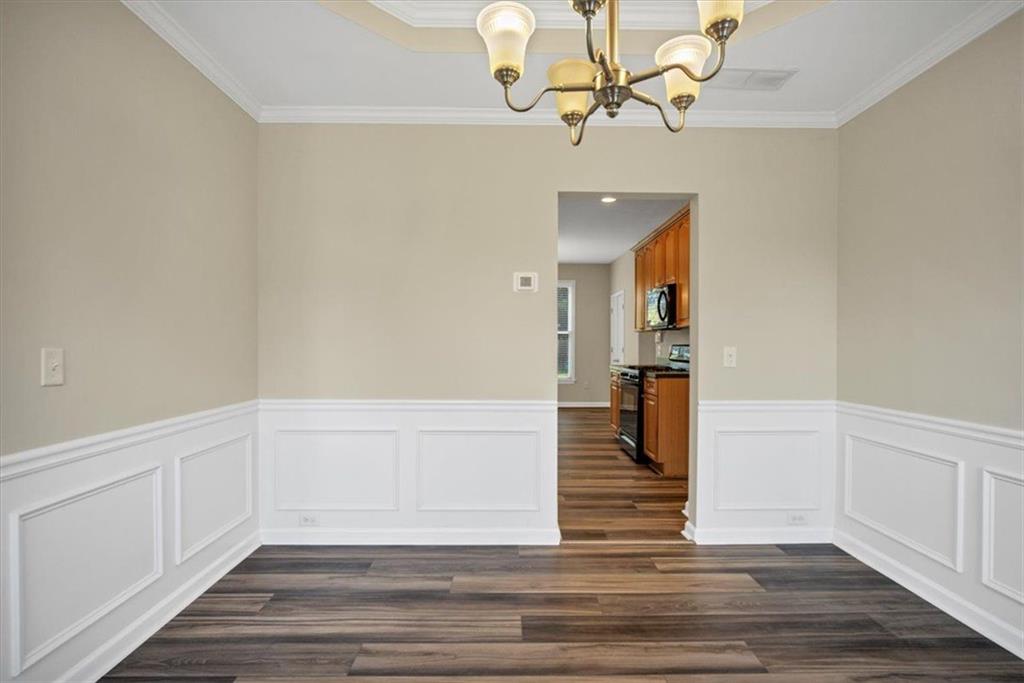 501 Middlebrooke Trace Canton, GA 30115 - Photo 10 of 29 a view of entryway and hall with wooden floor
