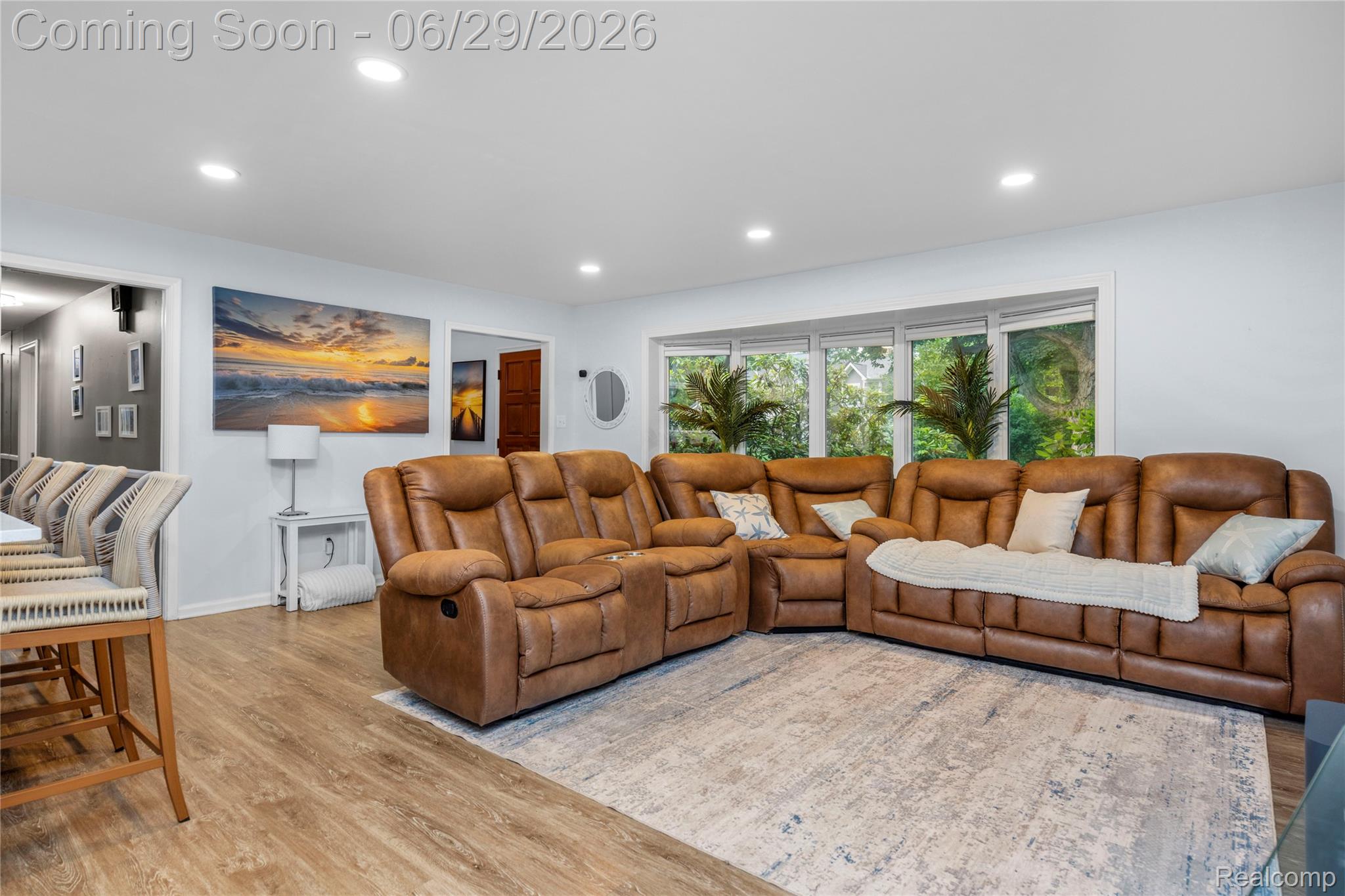 6085 Worlington Road Bloomfield Hills, MI 48301 - Photo 12 of 75 Spacious living area featuring bay windows, recessed lighting, wood-finish flooring, and white walls