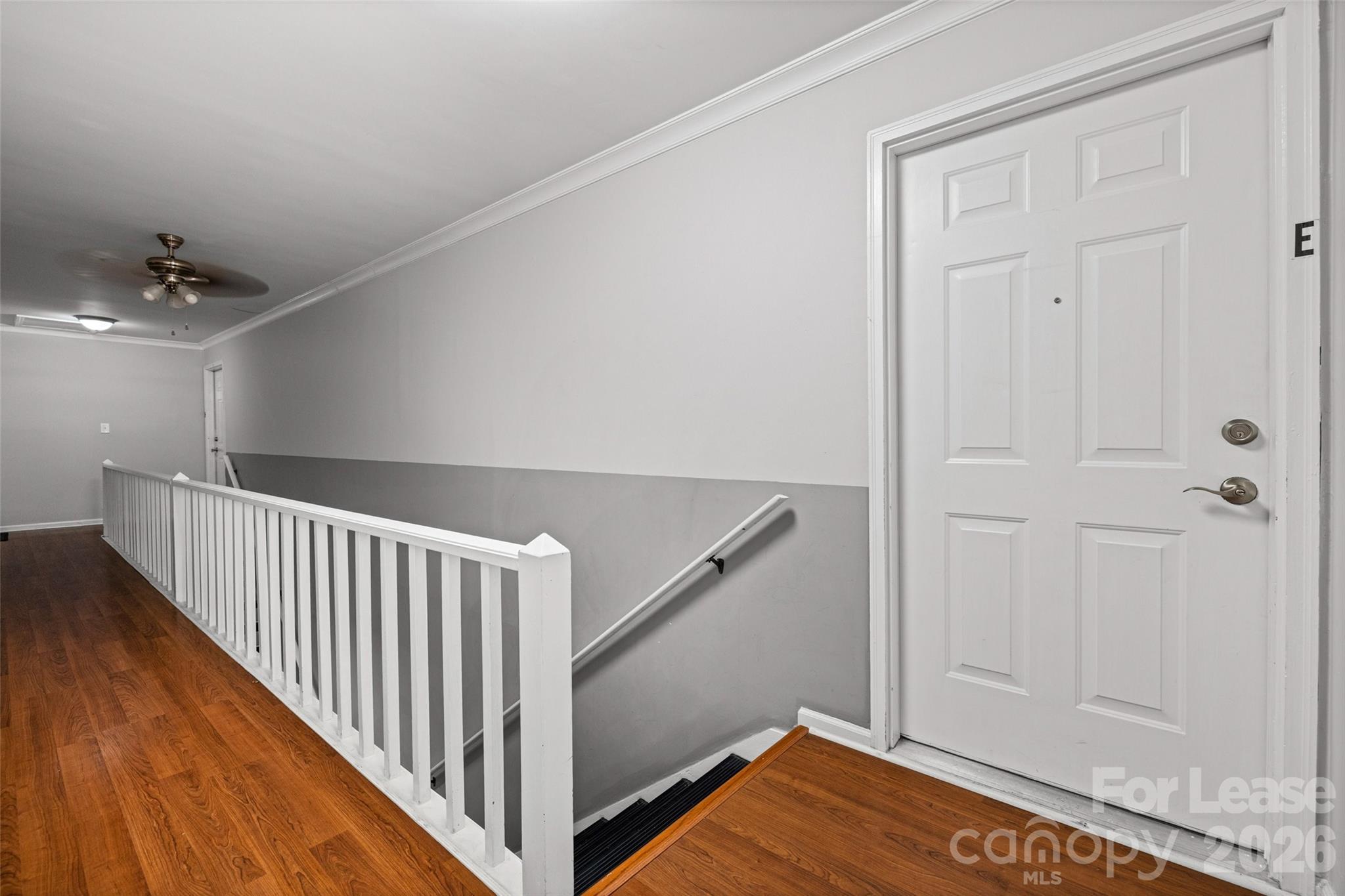 113 Stroupe Road, Unit E Gastonia, NC 28056 - Photo 4 of 33 a view of a hallway view with staircase
