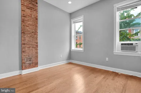 an empty room with windows