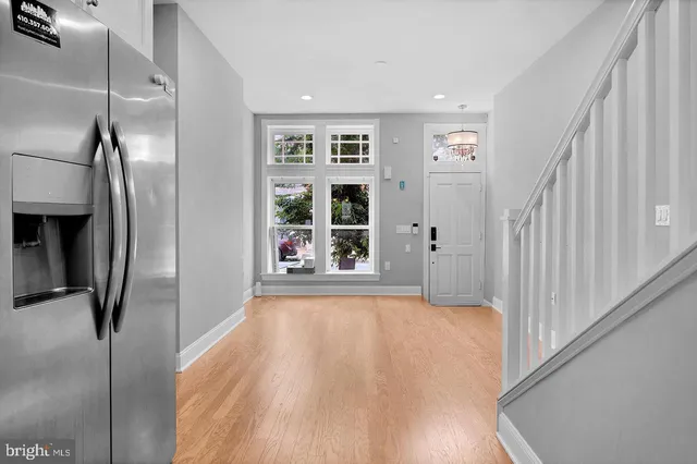 a view of livingroom with furniture and floor to ceiling window