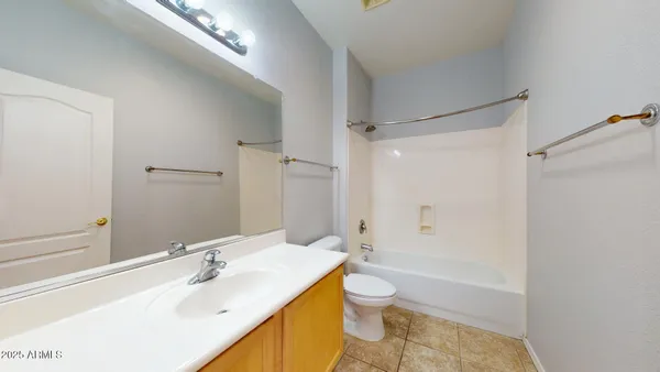 a bathroom with a sink toilet tub and shower