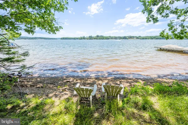 a view of lake with mountain