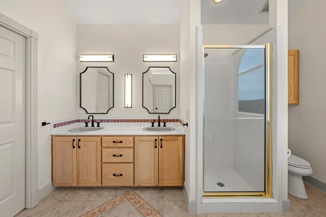 a bathroom with a bathtub and window