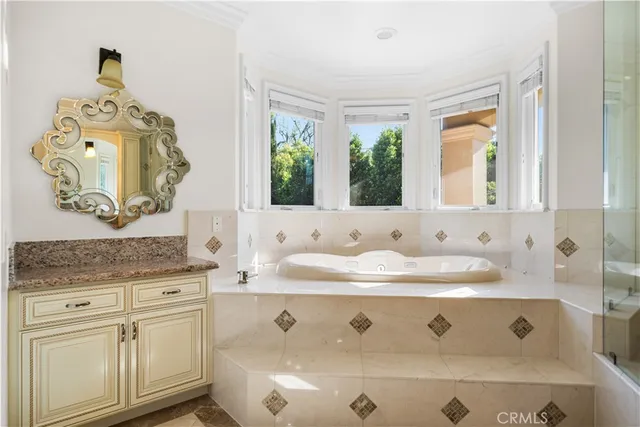 a view of balcony with furniture and garden