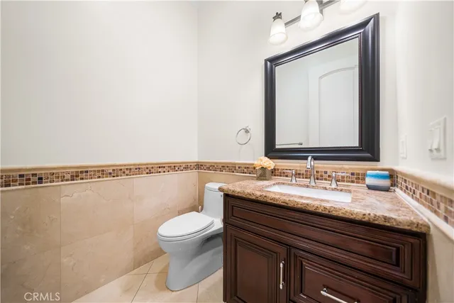 a spacious bedroom with a bed and a window