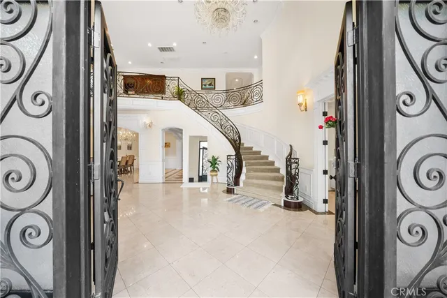 a view of a hallway with washer and dryer