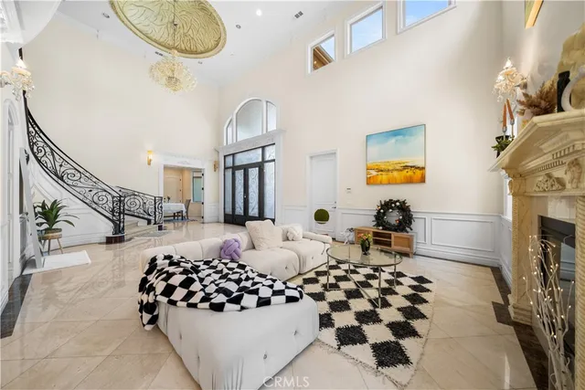 a bedroom with furniture and a fireplace