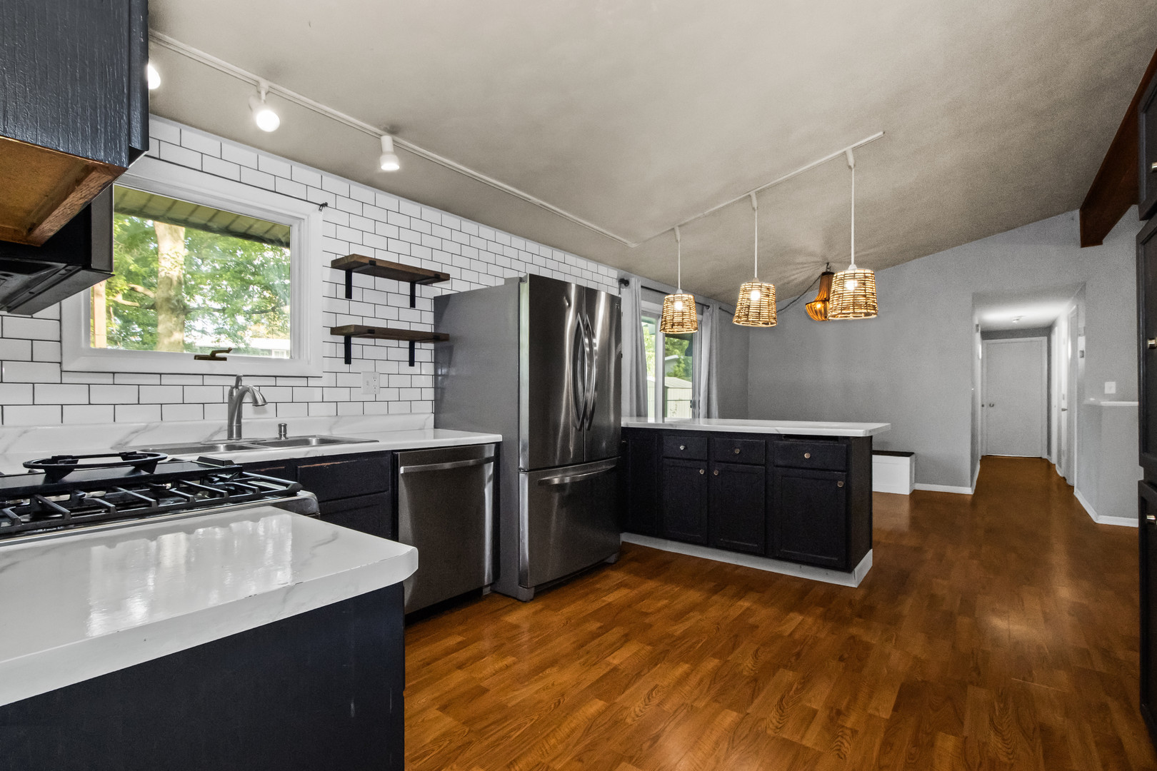 23 Cambridge Drive Spring Valley, IL 61362 - Photo 11 of 22 a kitchen with a sink stove and refrigerator