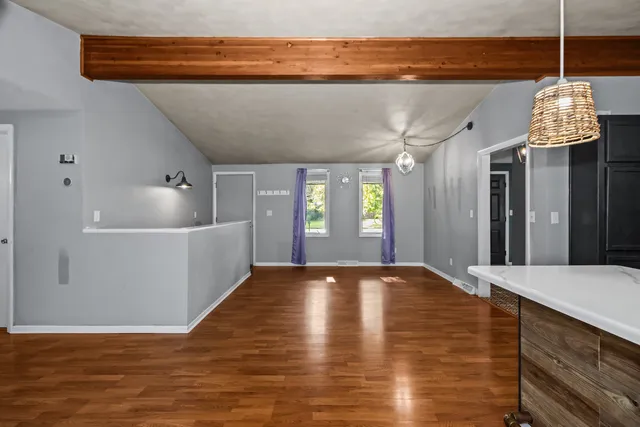 a view of an empty room and window