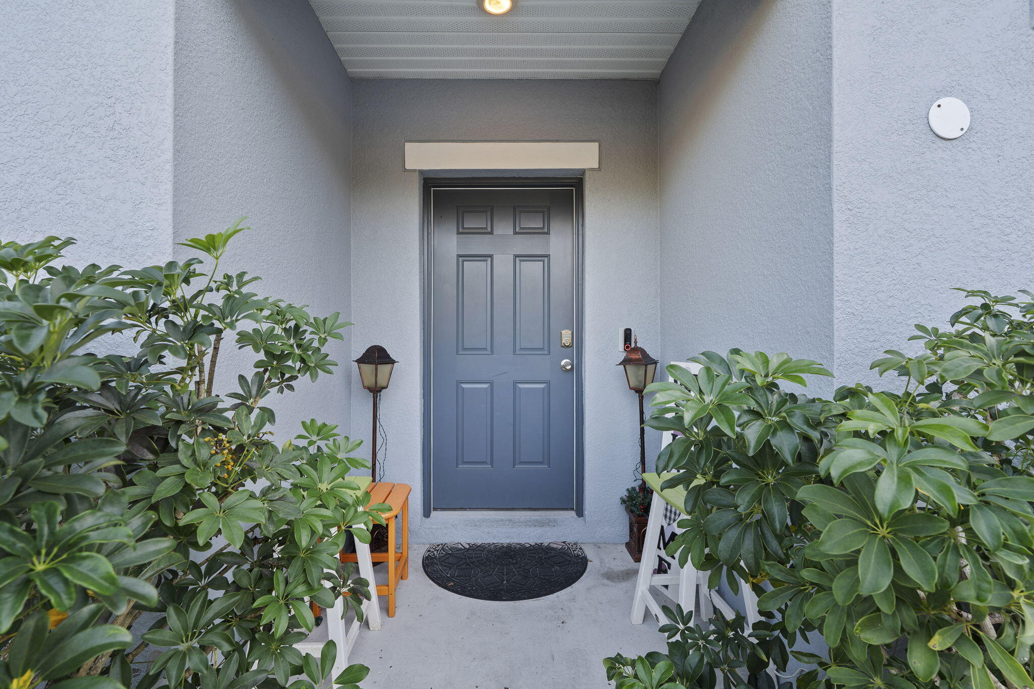 1414 Southwest Crest Avenue Port St. Lucie, FL 34953 - Photo 2 of 41 view of a entryway door of a house