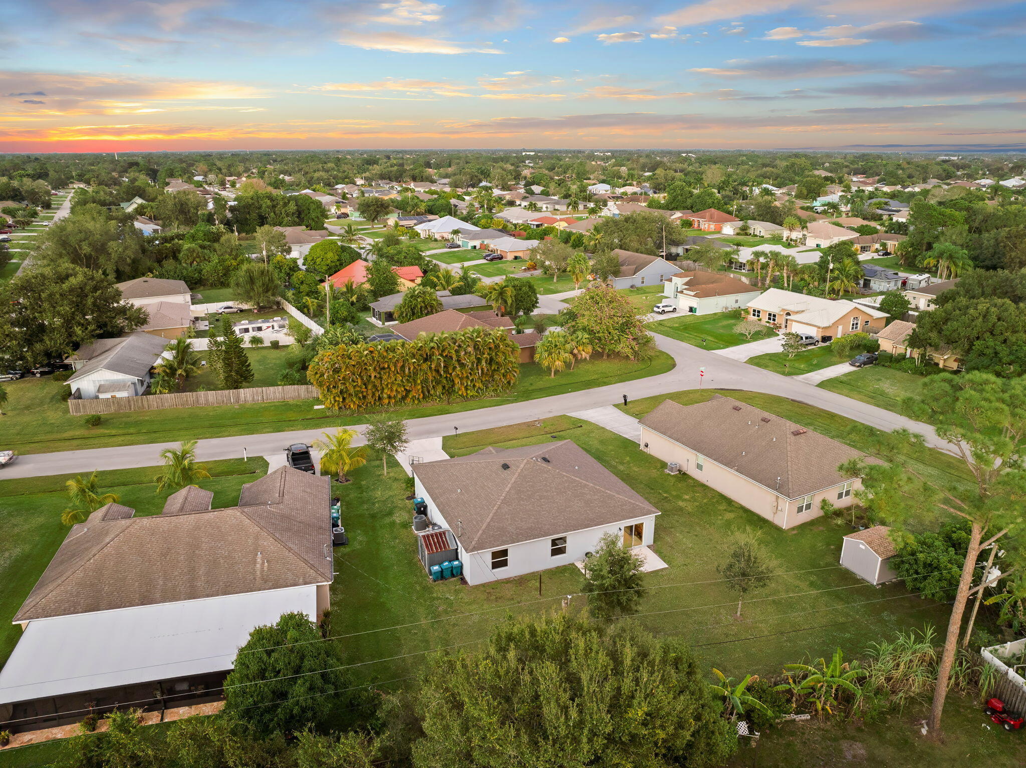 1414 Southwest Crest Avenue Port St. Lucie, FL 34953 - Photo 33 of 41 an aerial view of residential houses with outdoor space