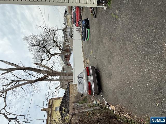 219 Renner Avenue Newark, NJ 07112 - Photo 22 of 22 a view of car parked on the side of a street
