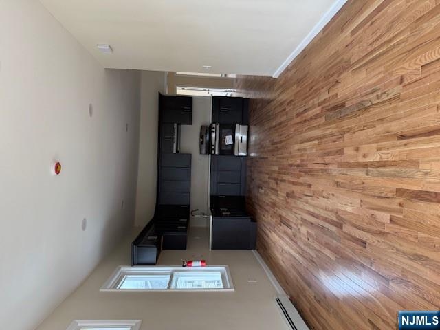 219 Renner Avenue Newark, NJ 07112 - Photo 3 of 22 a view of kitchen and wooden floor