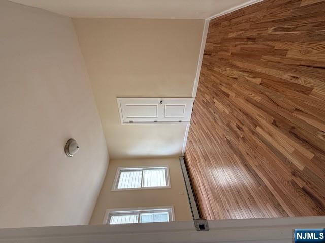 219 Renner Avenue Newark, NJ 07112 - Photo 7 of 22 a view of empty room with window and wooden floor