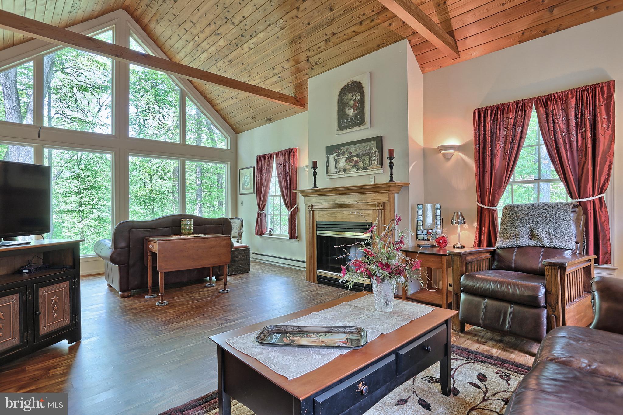 131 Valley Road Mount Gretna, PA 17064 - Photo 22 of 52 Family Room features vaulted ceiling & window wall