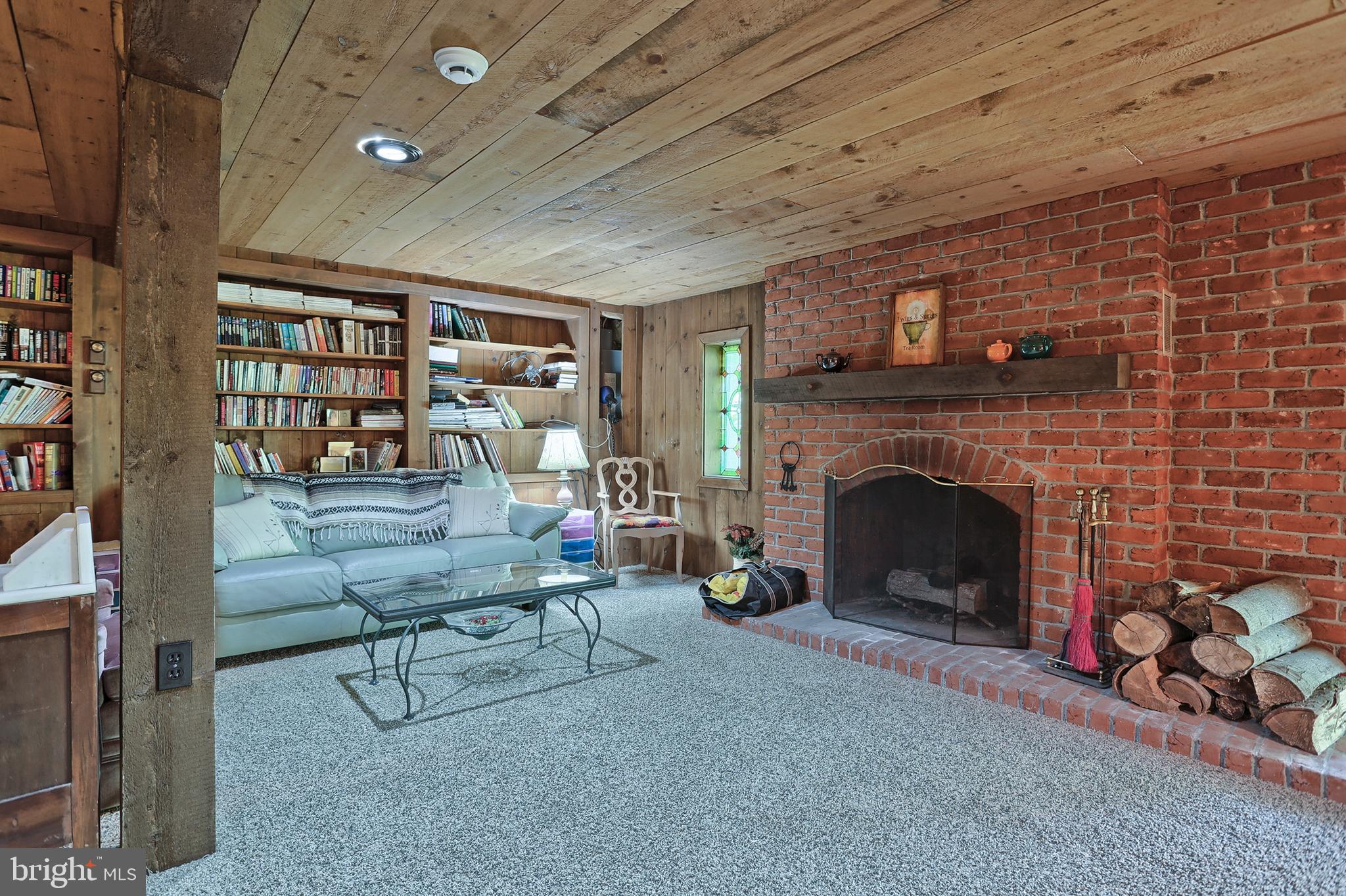 131 Valley Road Mount Gretna, PA 17064 - Photo 32 of 52 Lower level Family Room - wood burning fireplace