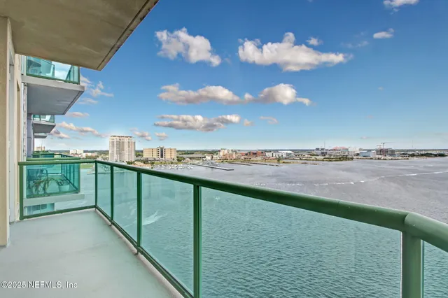 a view of a balcony with an outdoor space