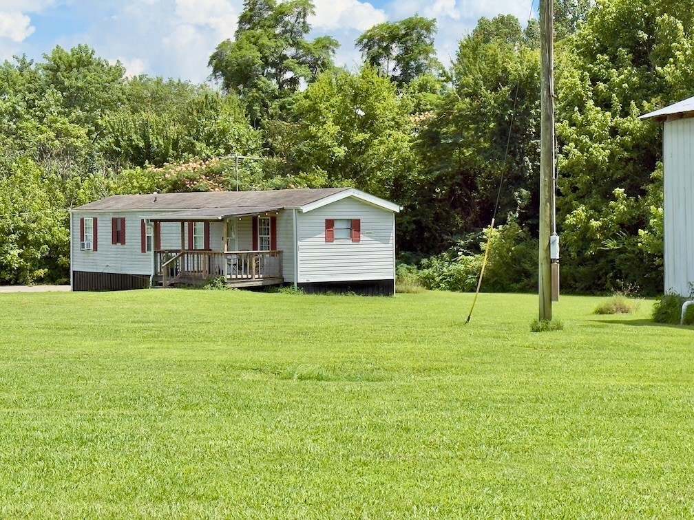 188 Eugene Reed Road Woodbury, TN 37190 - Photo 3 of 10 a house view with swimming pool in front of it