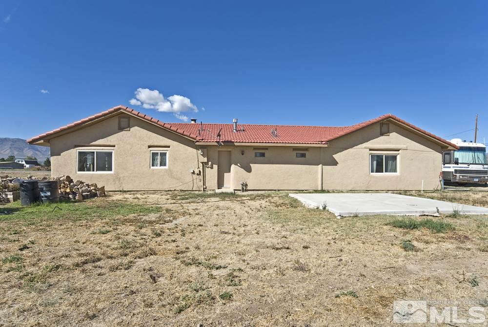 10810 Chesapeake Drive Reno, NV 89506 - Photo 6 of 22 a view of a house with a yard