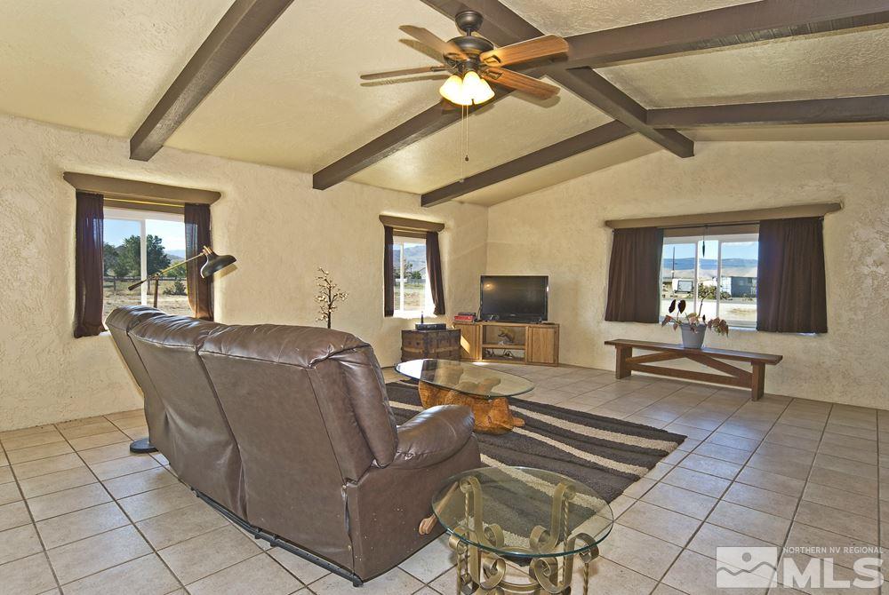 10810 Chesapeake Drive Reno, NV 89506 - Photo 9 of 22 a living room with furniture and a flat screen tv