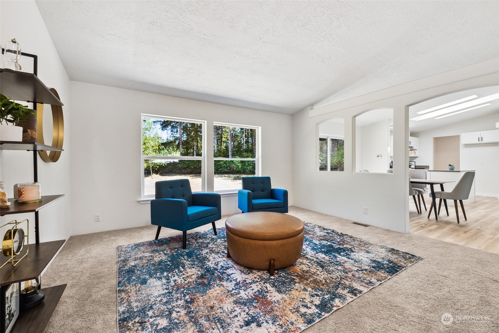 271 East Leffler Loop Road Grapeview, WA 98546 - Photo 14 of 36 a living room with furniture and a window