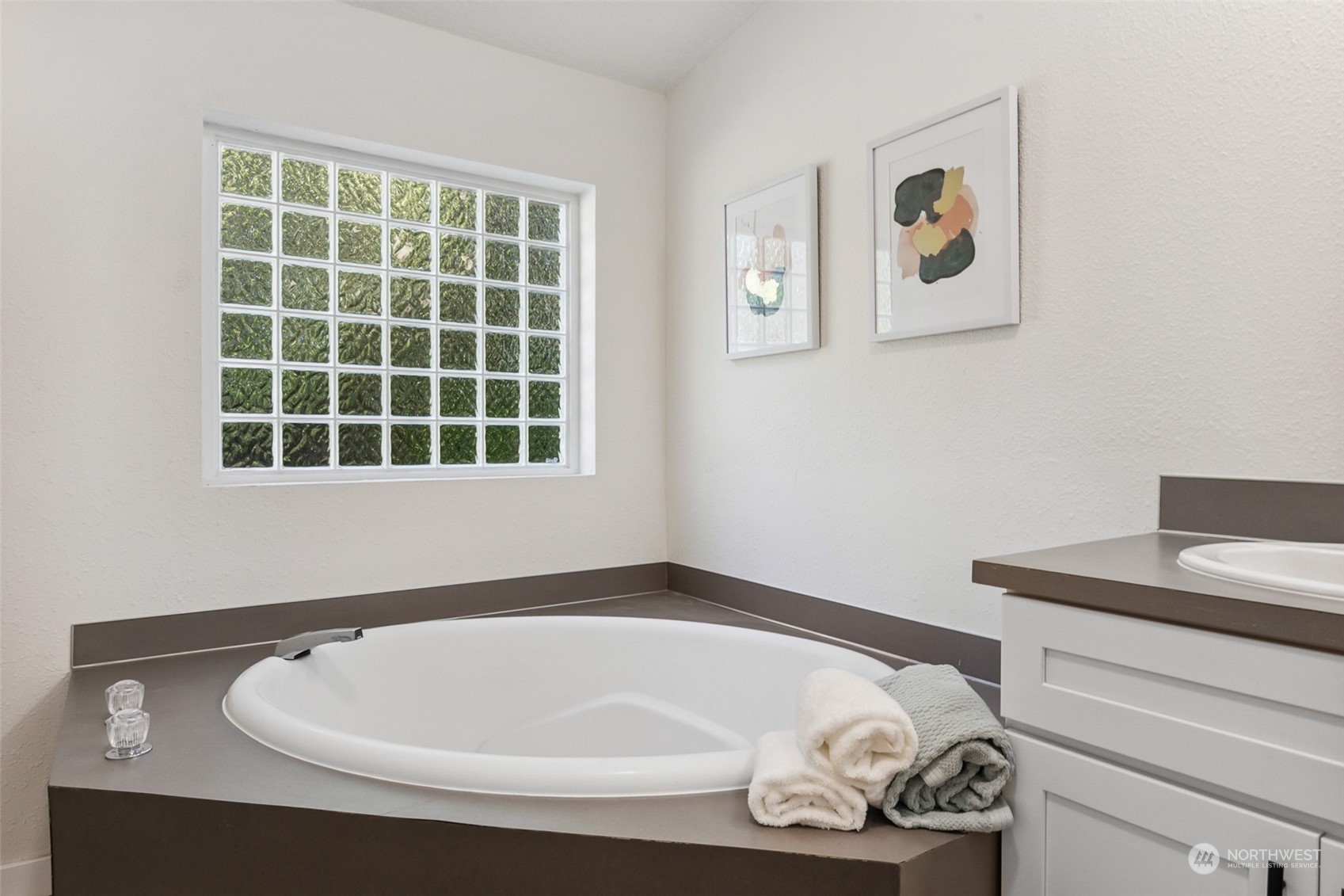 271 East Leffler Loop Road Grapeview, WA 98546 - Photo 23 of 36 a bathroom with a sink and a window