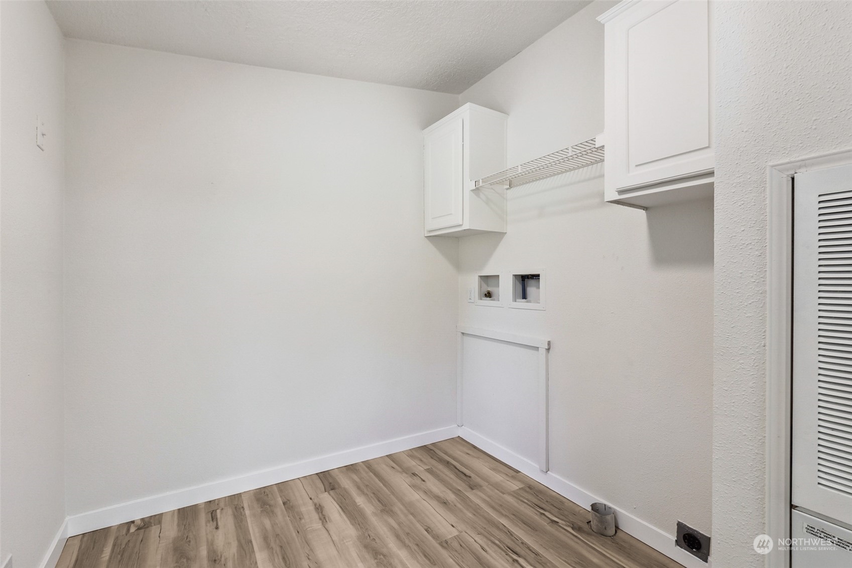 271 East Leffler Loop Road Grapeview, WA 98546 - Photo 24 of 36 a view of storage and utility room with empty racks