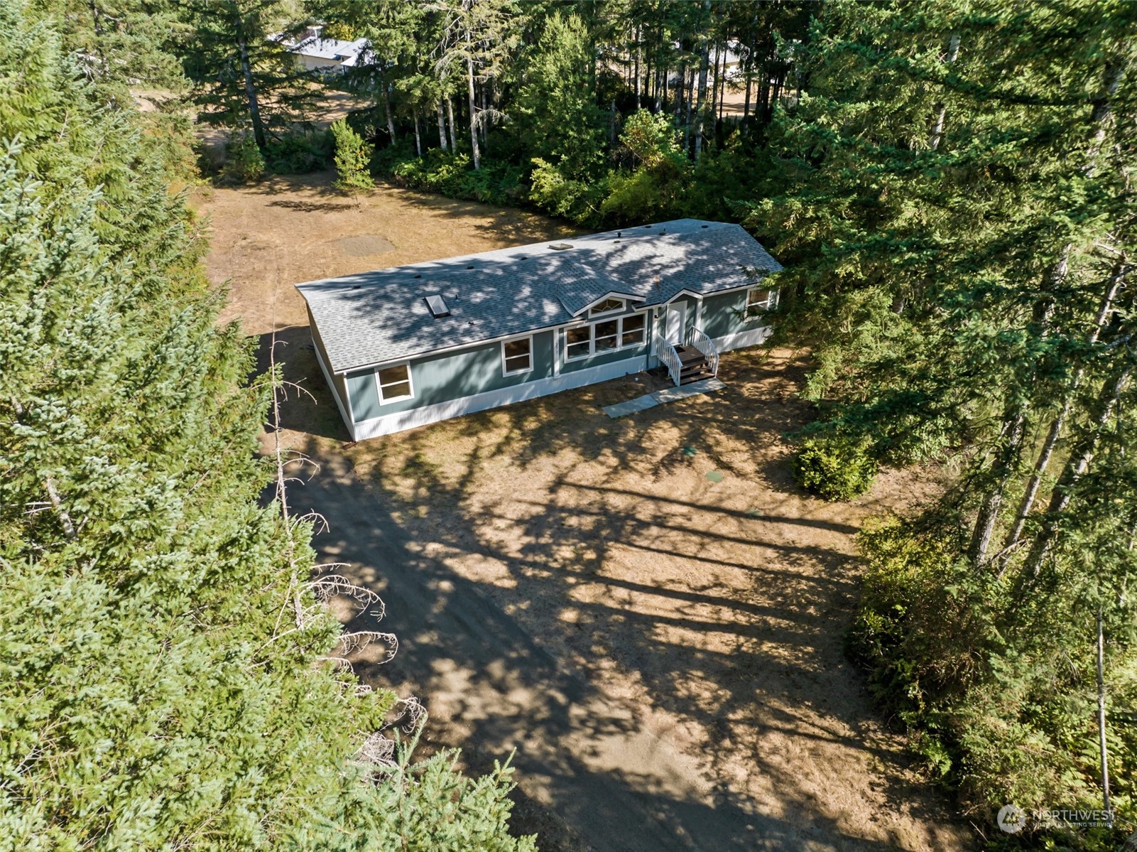 271 East Leffler Loop Road Grapeview, WA 98546 - Photo 3 of 36 a view of a backyard