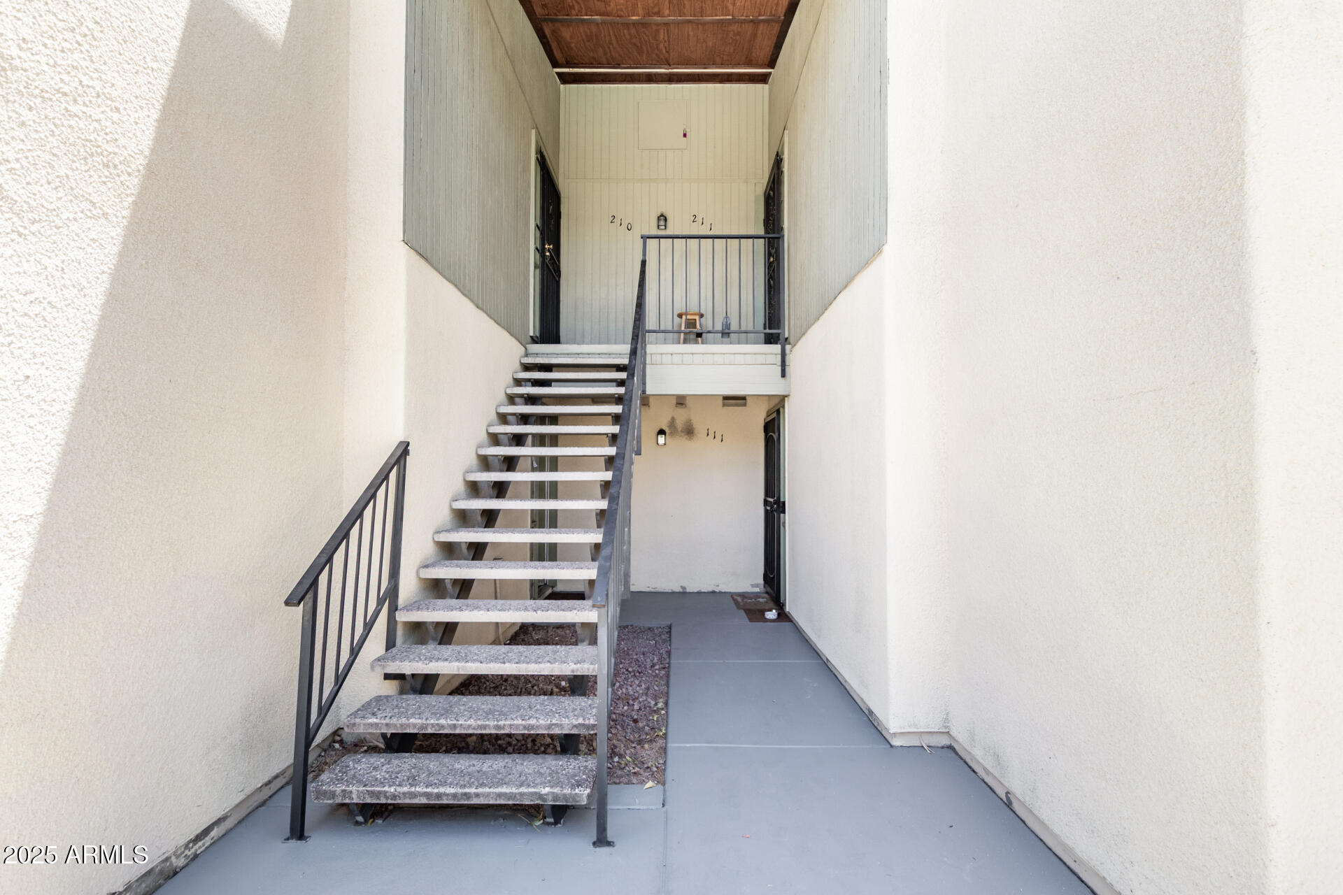 729 West Coolidge Street, Unit 211 Phoenix, AZ 85013 - Photo 2 of 21 a view of entryway with stairs