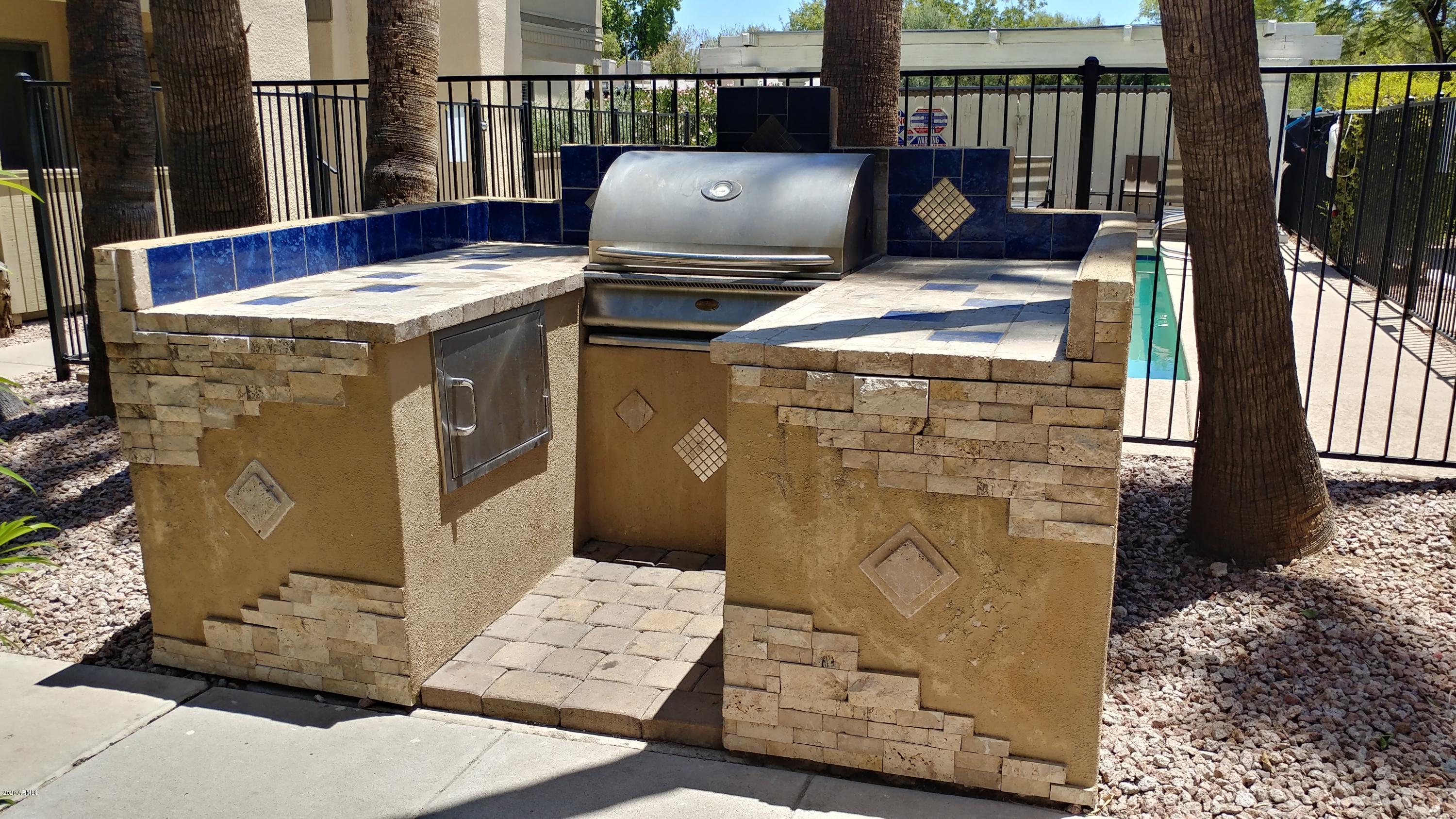 729 West Coolidge Street, Unit 211 Phoenix, AZ 85013 - Photo 21 of 21 a view of barbeque area with seating
