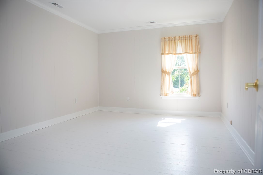 8669 Guinea Road Hayes, VA 23072 - Photo 44 of 49 Upstairs Bedroom with plank flooring
