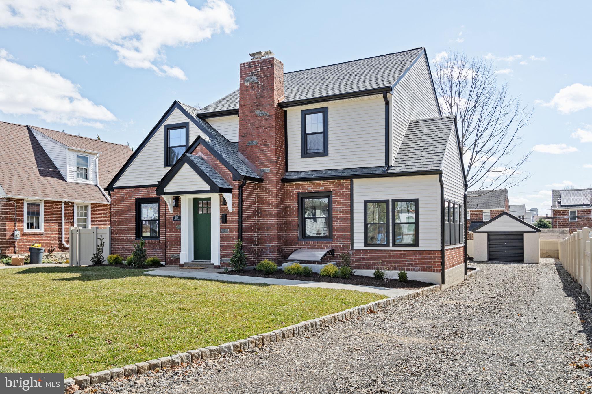 1439 Dorchester Road Havertown, PA 19083 - Photo 1 of 60 a front view of a house with a yard