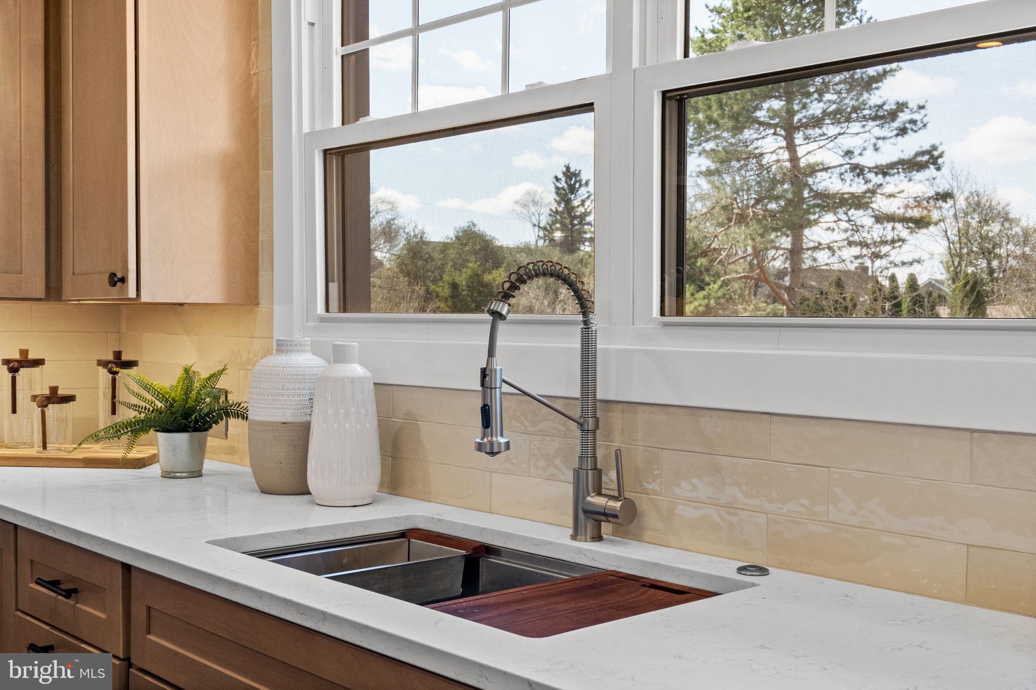 1439 Dorchester Road Havertown, PA 19083 - Photo 14 of 60 a bathroom with a sink and a window