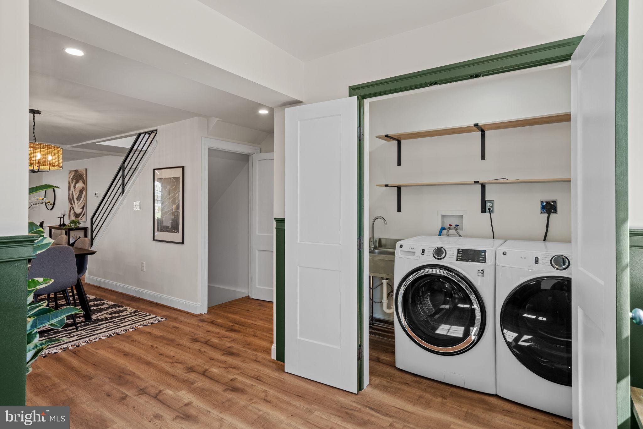 1439 Dorchester Road Havertown, PA 19083 - Photo 23 of 60 a view of a hallway with washer and dryer