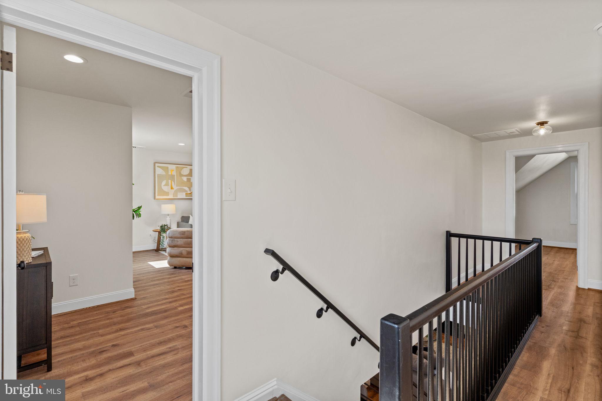 1439 Dorchester Road Havertown, PA 19083 - Photo 25 of 60 a view of a hallway with wooden floor and staircase