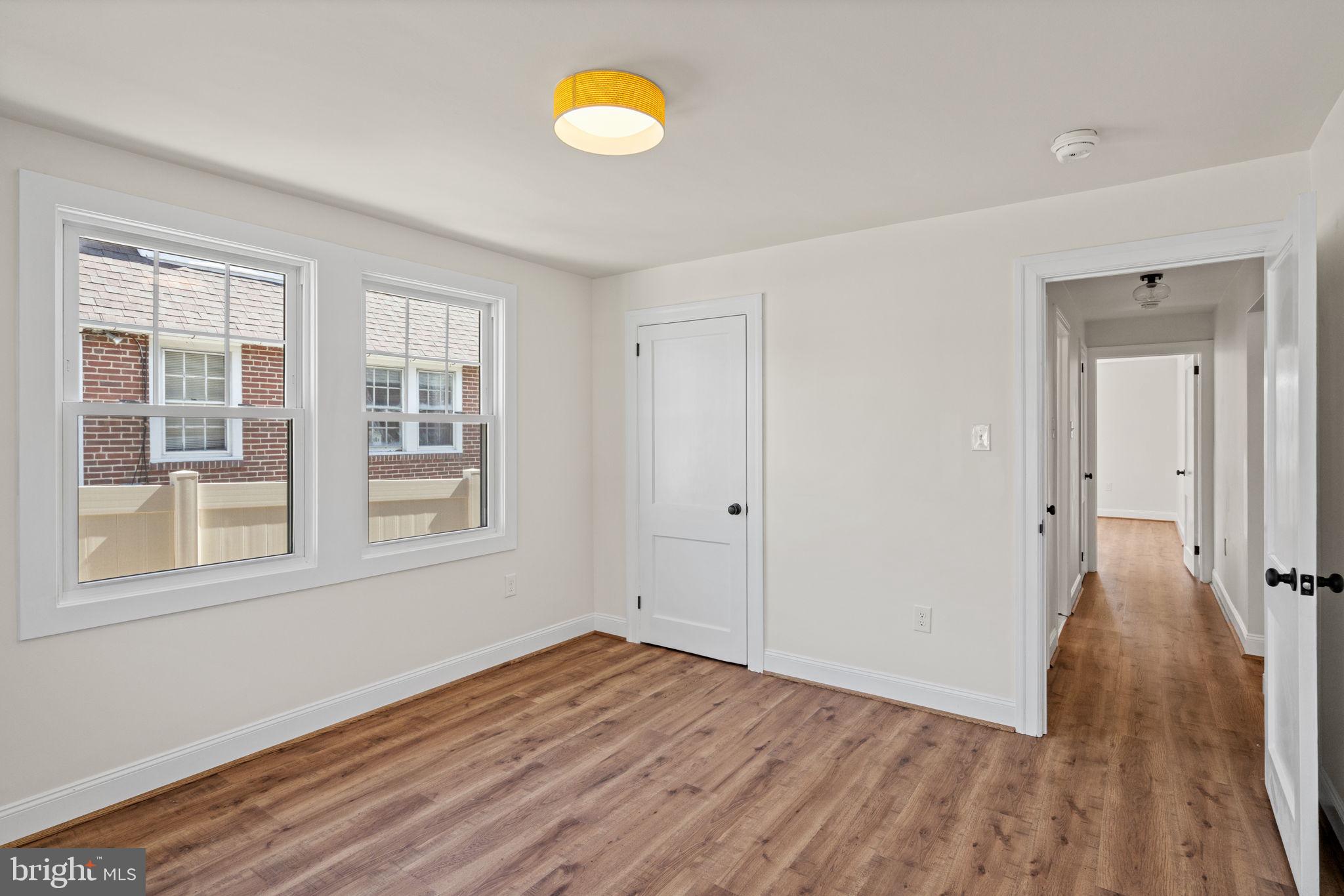 1439 Dorchester Road Havertown, PA 19083 - Photo 37 of 60 a view of a room with wooden floor and window