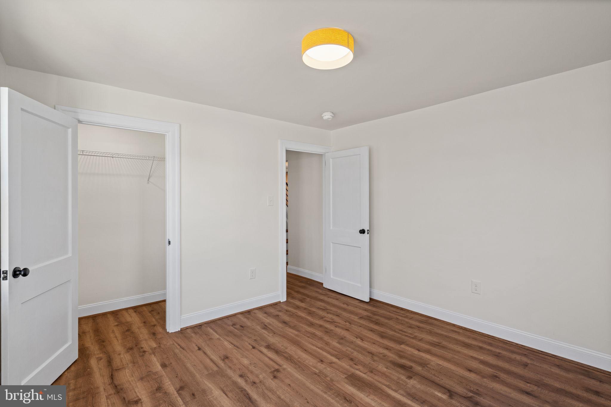 1439 Dorchester Road Havertown, PA 19083 - Photo 39 of 60 a view of an empty room with wooden floor