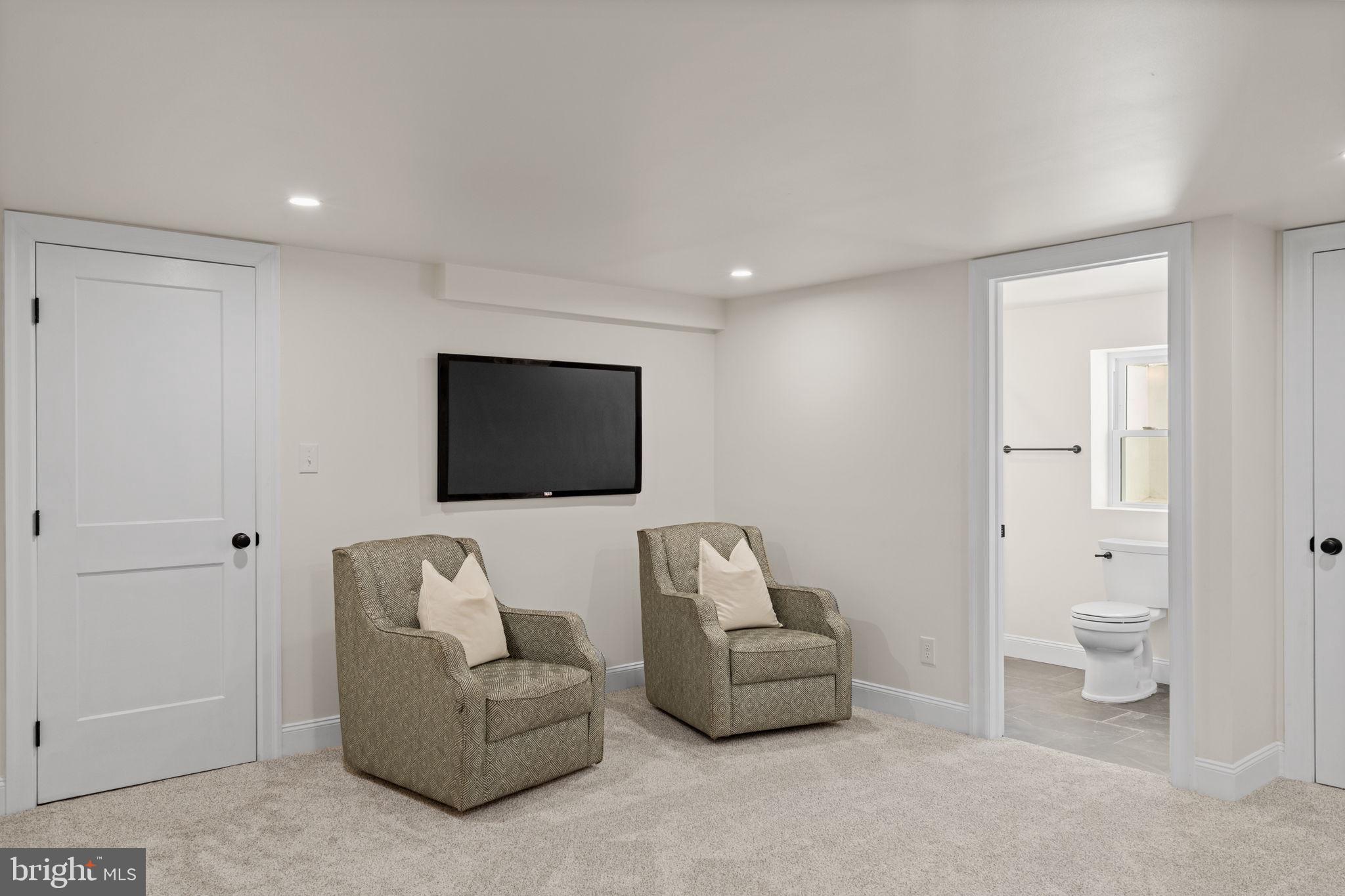 1439 Dorchester Road Havertown, PA 19083 - Photo 48 of 60 a living room with furniture and a flat screen tv