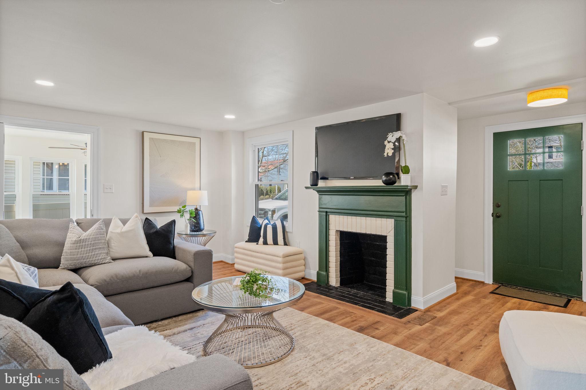1439 Dorchester Road Havertown, PA 19083 - Photo 5 of 60 a living room with furniture and a fireplace