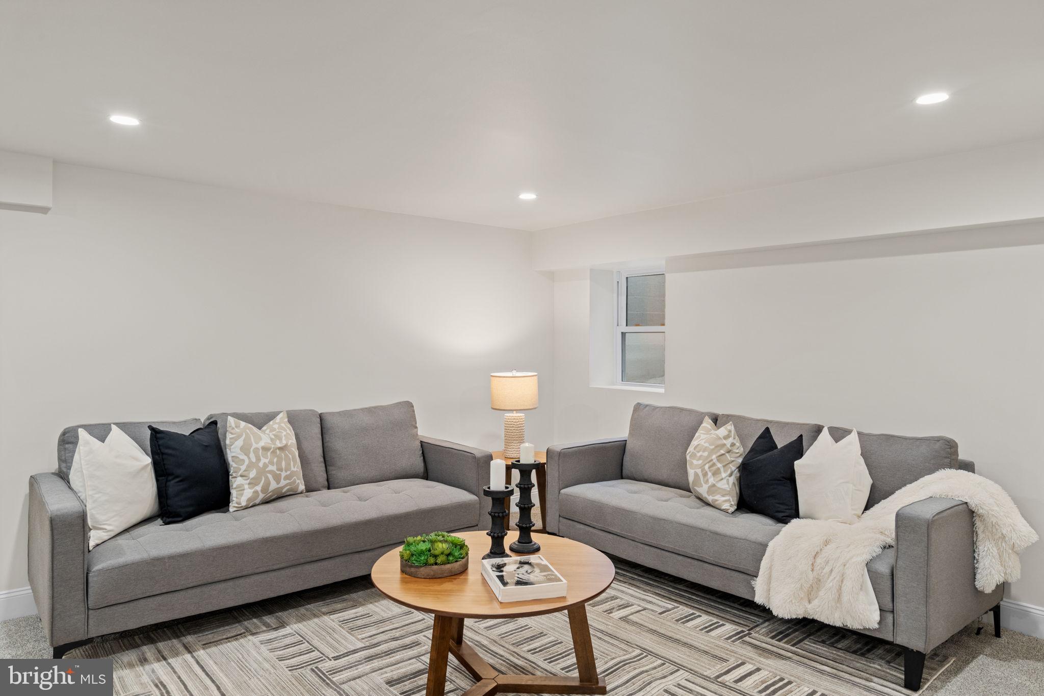 1439 Dorchester Road Havertown, PA 19083 - Photo 53 of 60 a living room with furniture and a lamp